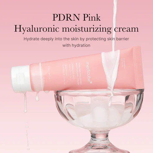 Medicube PDRN Pink Hyaluronic Moisturizing Cream — Hydrate deeply into the skin by protecting skin barrier with hydration pink background water splash