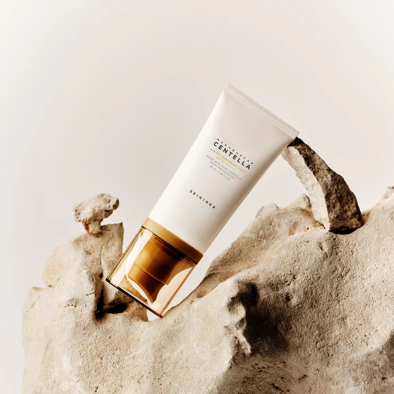 SKIN1004 Madagascar Centella Air-Fit Suncream Light SPF50 PA+++ 50ml — tube on stone