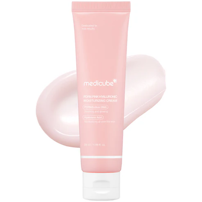 Medicube PDRN Pink Hyaluronic Moisturizing Cream — pink tube with cream swatch white background